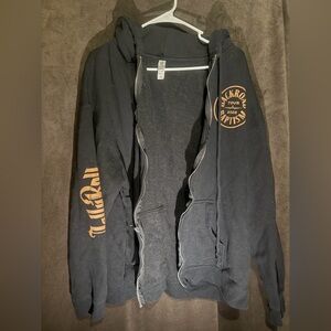 Black Zip-Up Hoodie with Orange Tour Graphics